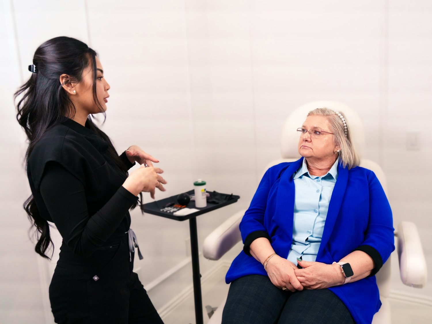 A clinician talking through options with a patient during a consultation